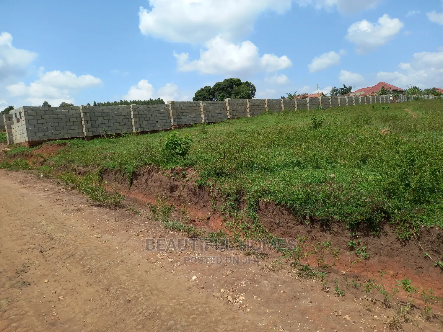 Kasangati 100 by 100 in Fenced Estate on Sell in Nangabo