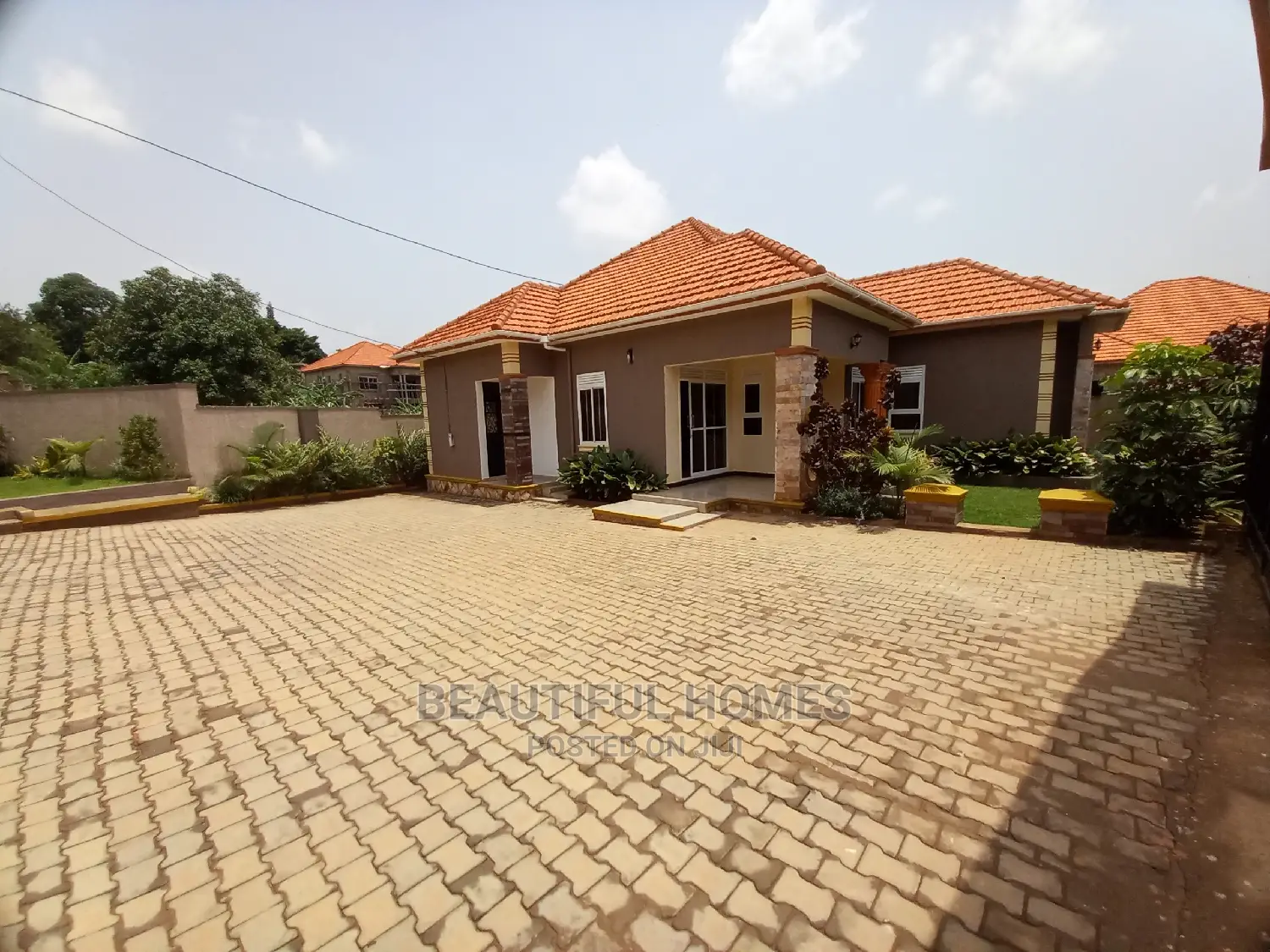 Furnished 4bdrm Bungalow in Kira Wealthy Tarmack for Sale in Kira