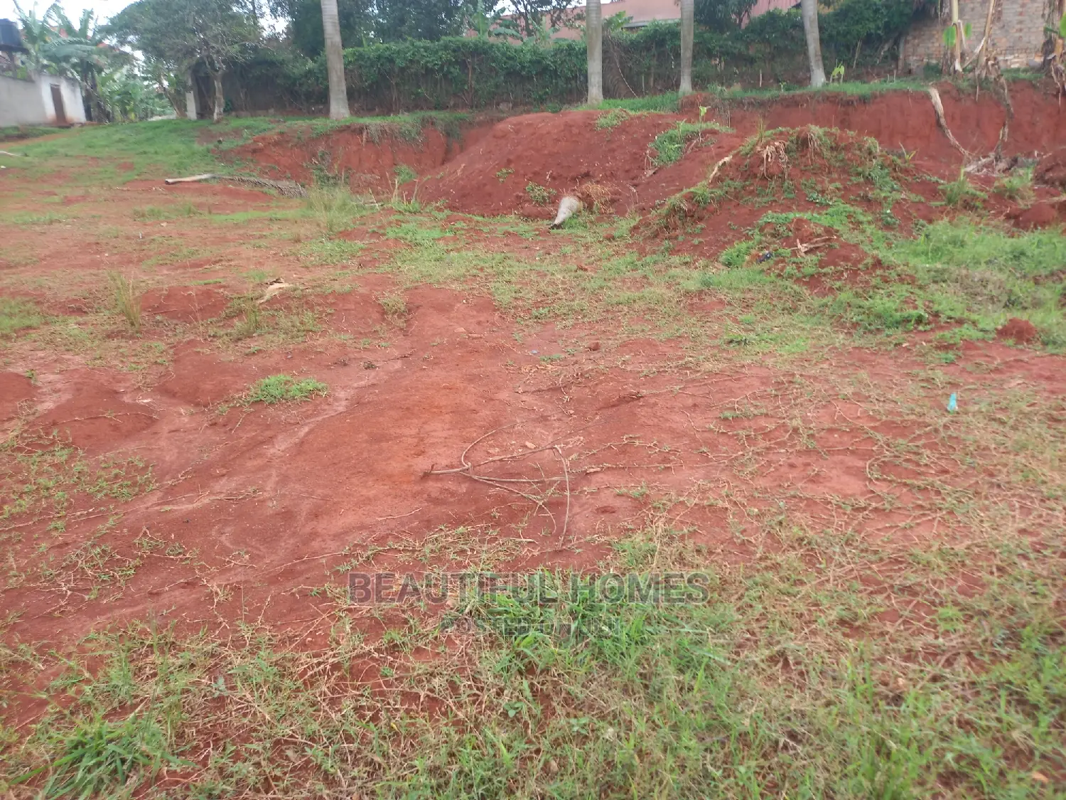 Kisaasi Komamboga Near the Tarmack Land in Central Division