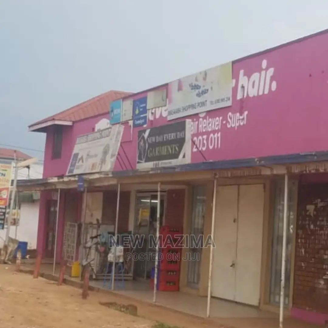 Busy Commercial Shops Measuring Direct on Tarmac of Ntebe Rd in Central Division