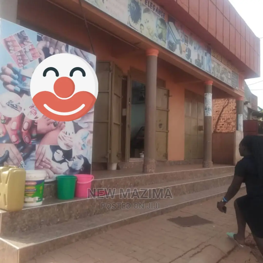 Three Busy Commercial Shops on Quicksale in Heart of Nansana in Division A