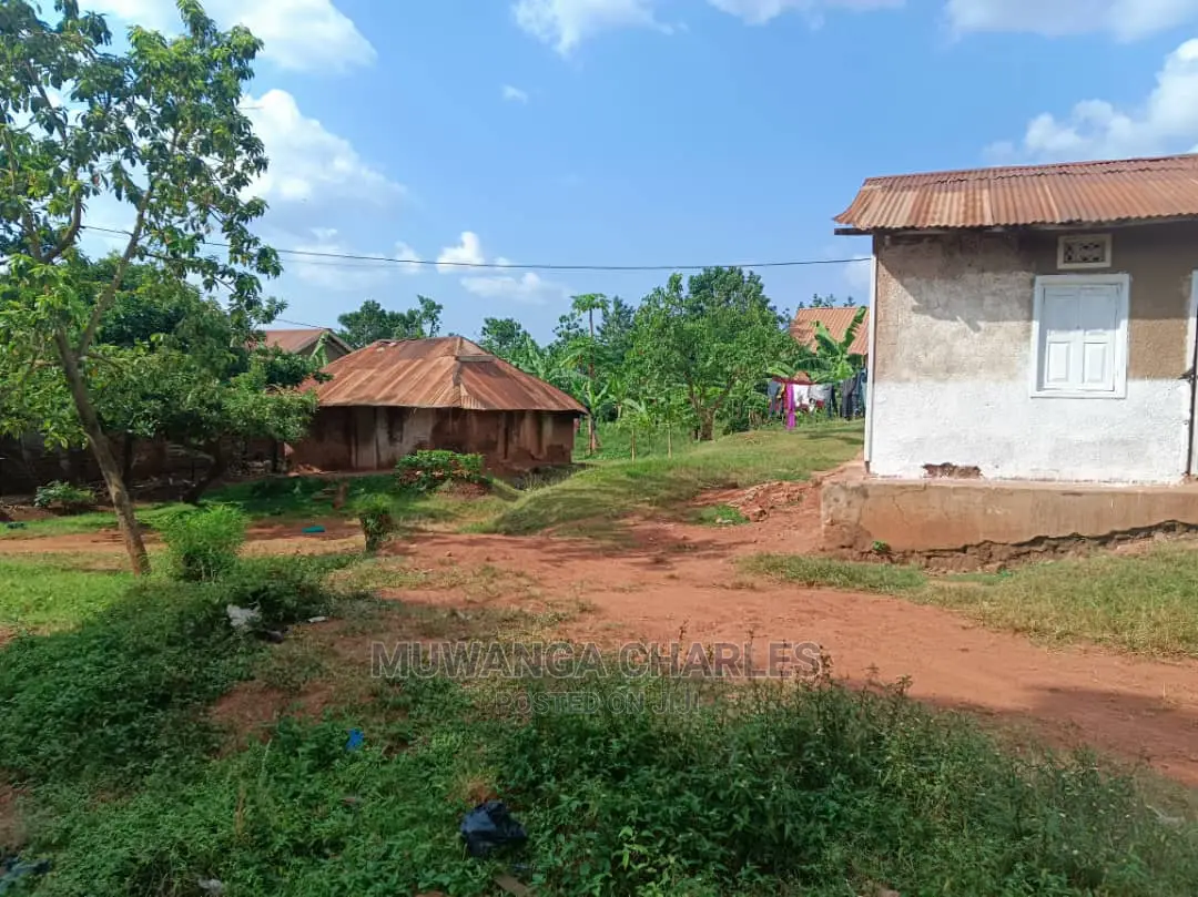 100by100ft Plot in Kulambiro on Quick Sale in Central Division