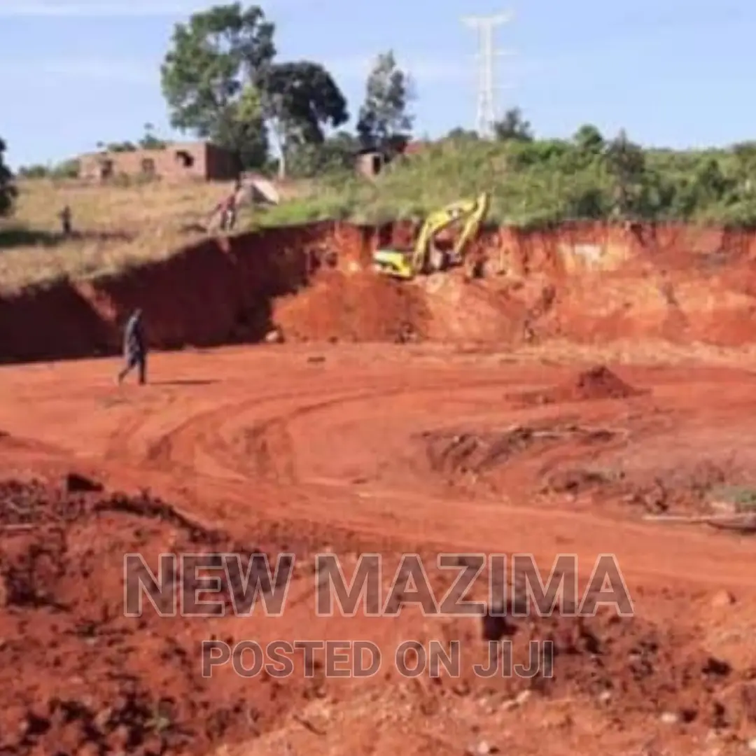 4.8 Acres Measuring Direct From Tarmac of Masaka Rd Titled in Central Division