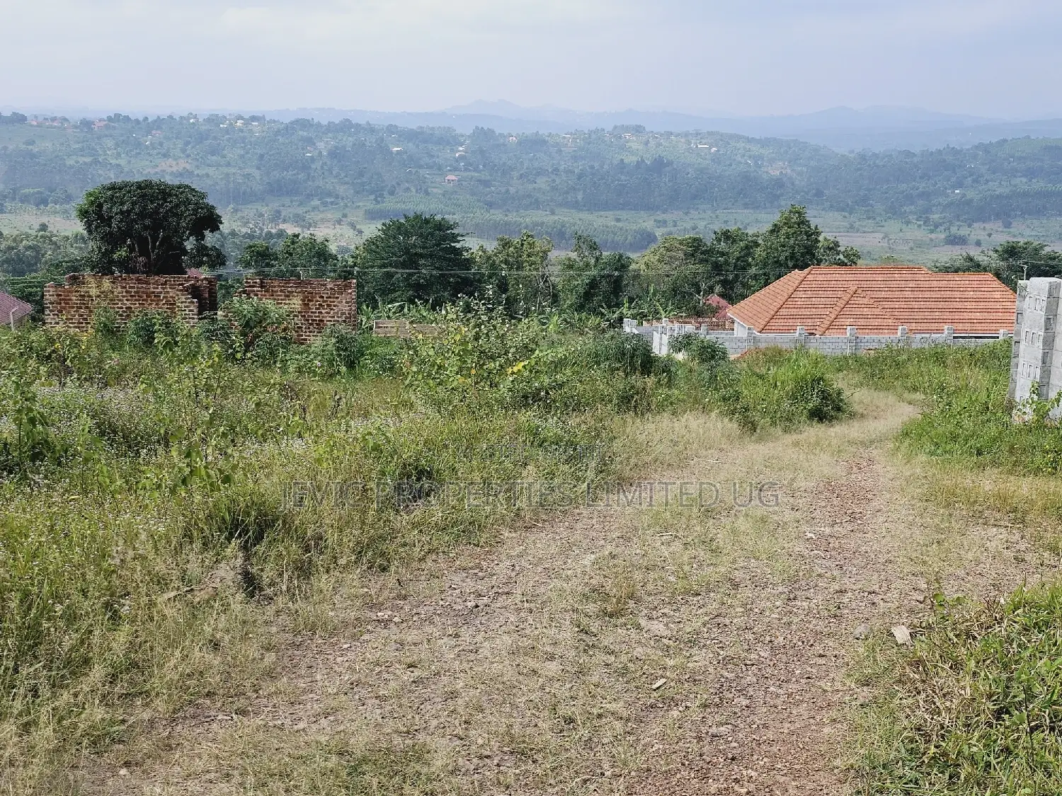 Titled Plot on Quick Sale Kakiri Kikugi Along Hoima Road in Kakiri
