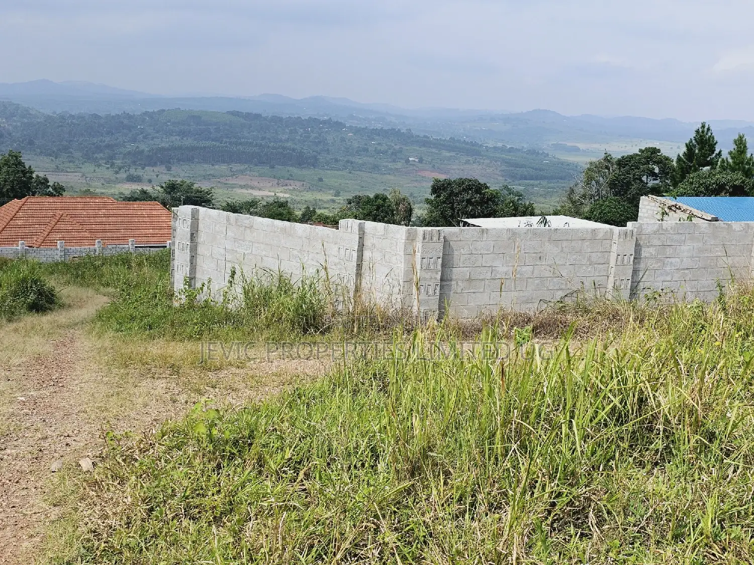 Titled Plot on Quick Sale Kakiri Kikugi Along Hoima Road in Kakiri