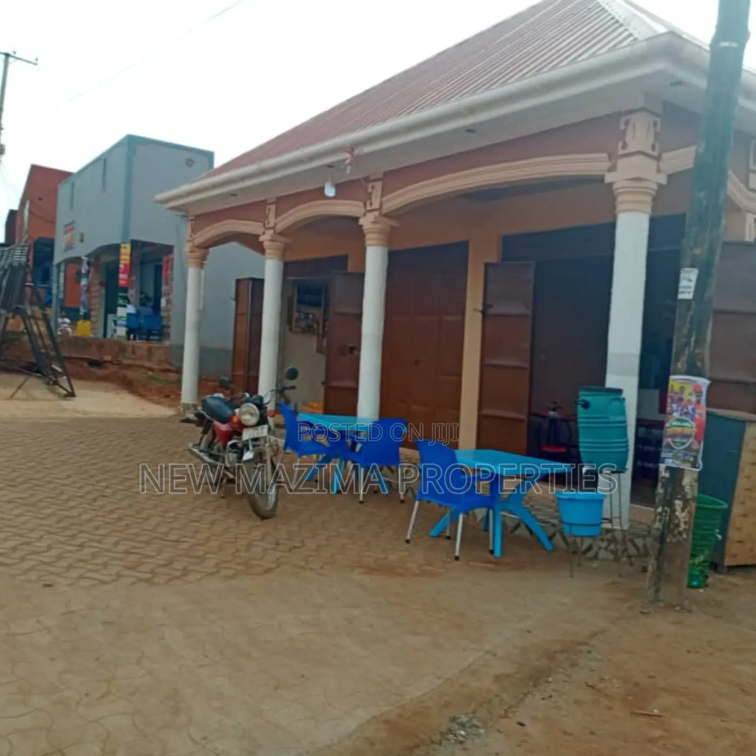 Three Commercial Double Shops With 8 Singles Onsale Nansana in Division A
