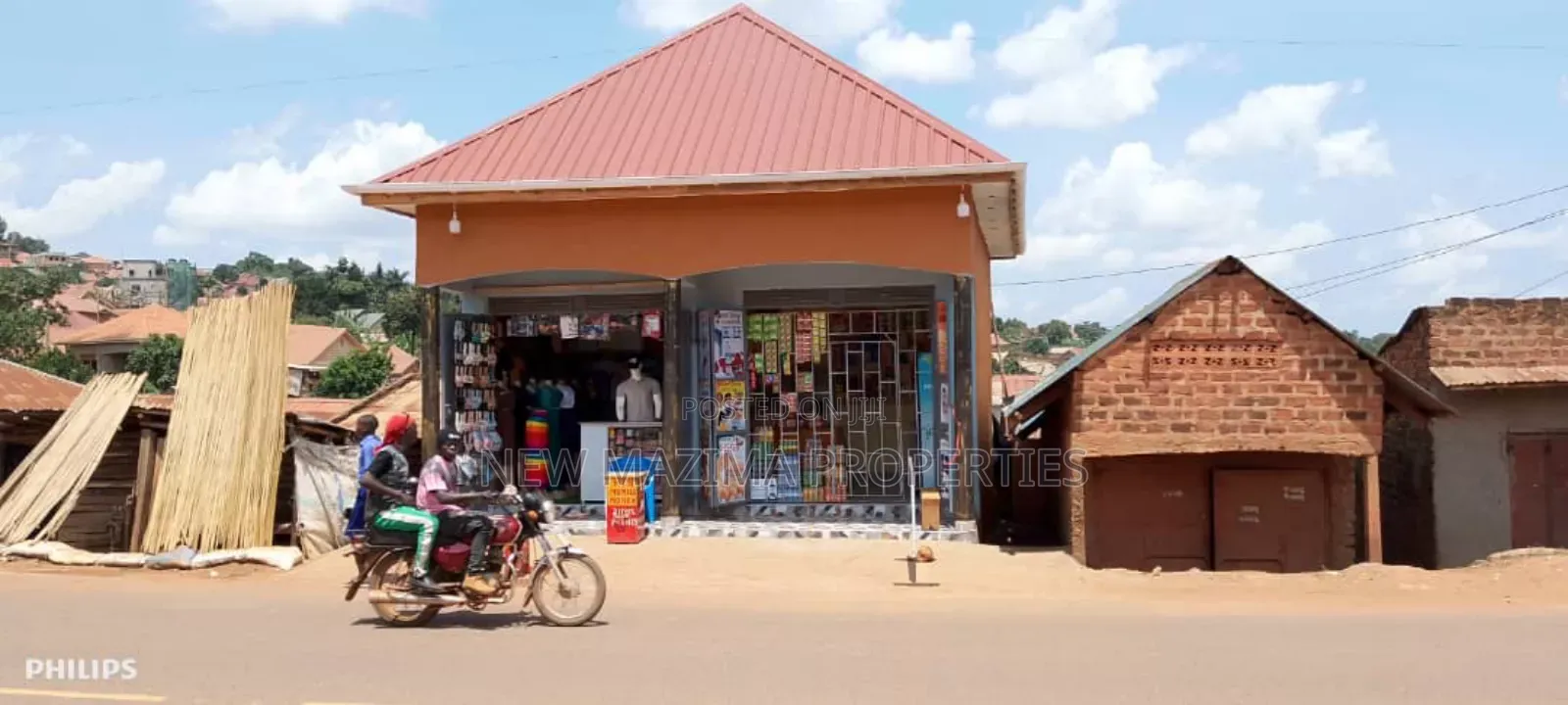 Very Busy Commercial Two Double Shops on Forced Sale Nansana Town in Central Division