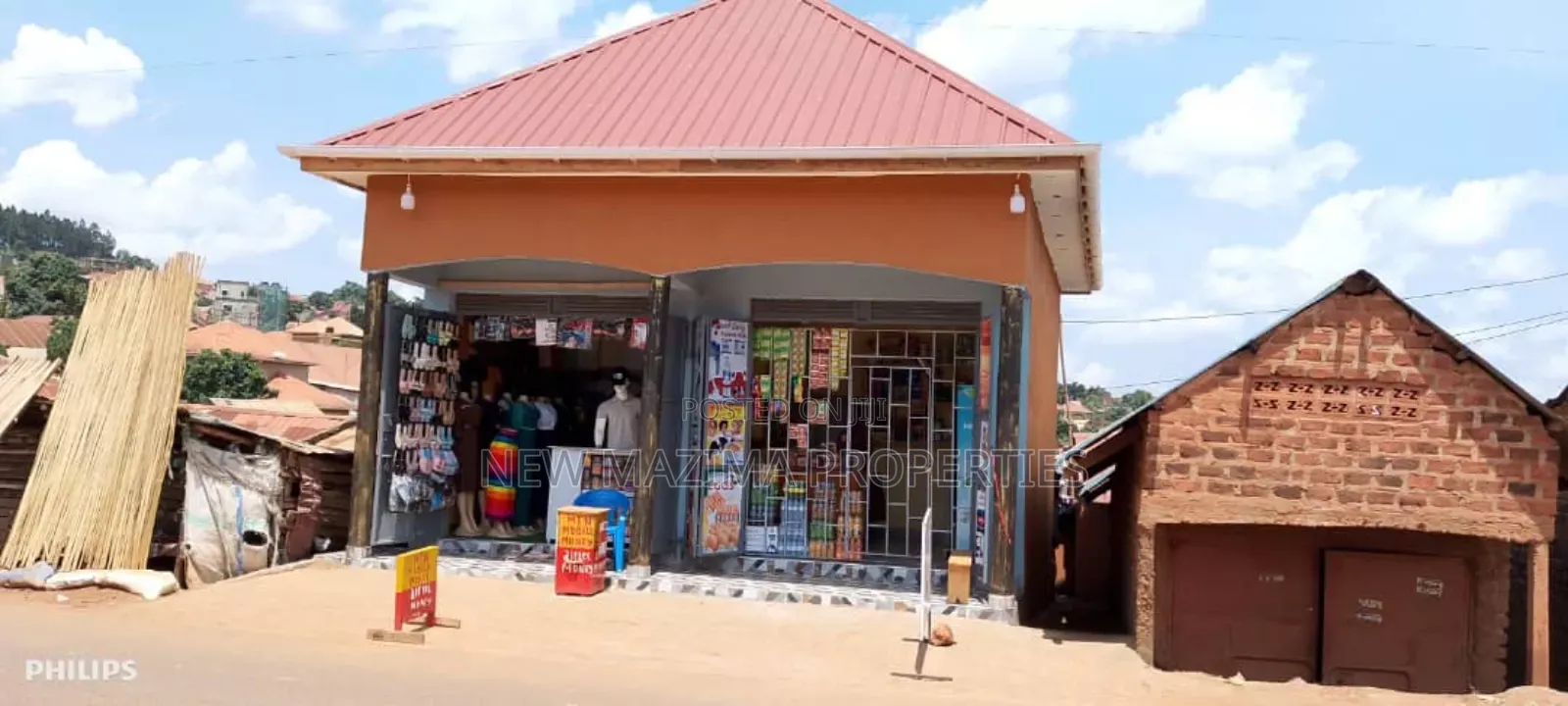 Very Busy Commercial Two Double Shops on Forced Sale Nansana Town in Central Division