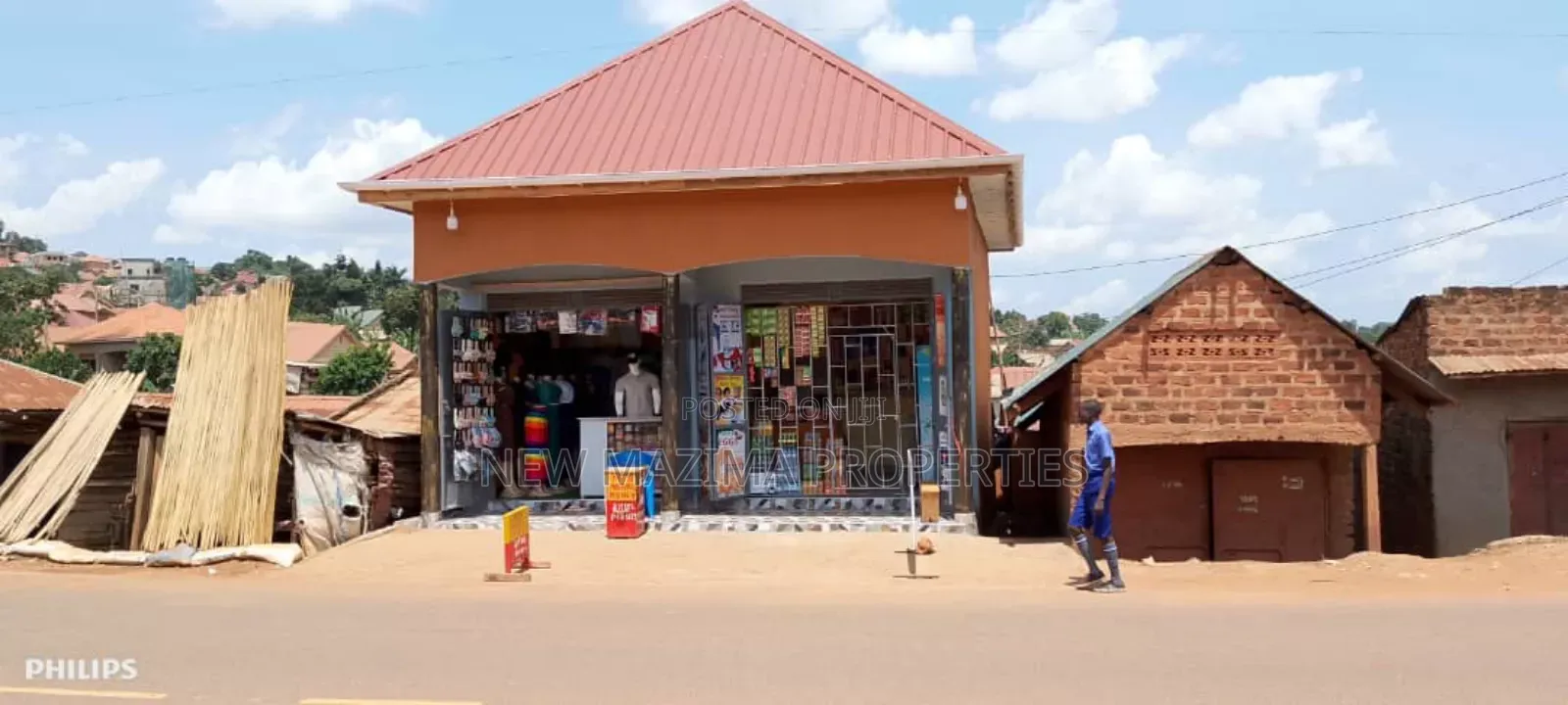 Very Busy Commercial Two Double Shops on Forced Sale Nansana Town in Central Division