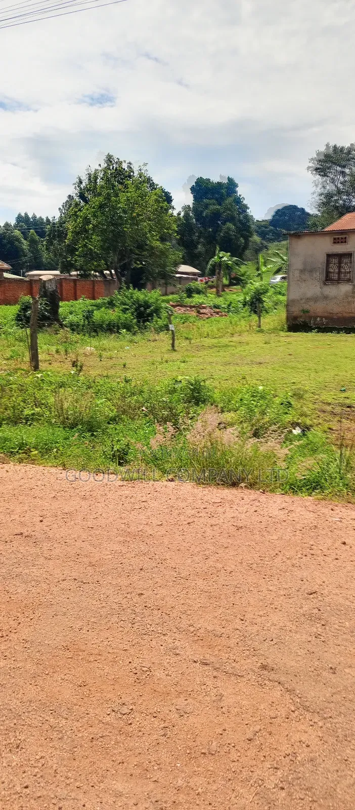 100*100 Feet / 25 Decimals of Land Bulega Garuga on Main Tarmac Road in Central Division