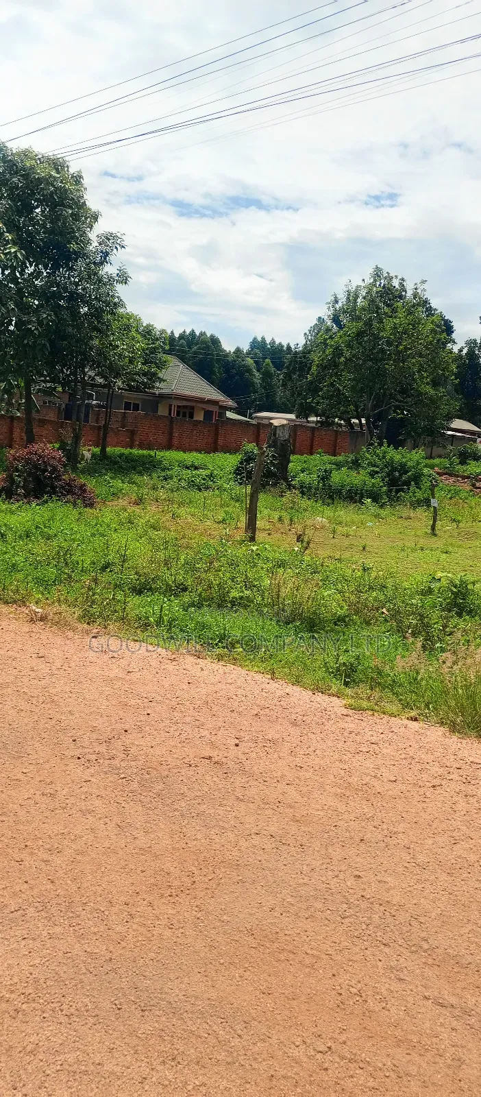 100*100 Feet / 25 Decimals of Land Bulega Garuga on Main Tarmac Road in Central Division