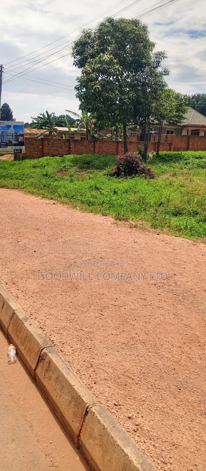 100*100 Feet / 25 Decimals of Land Bulega Garuga on Main Tarmac Road in Central Division