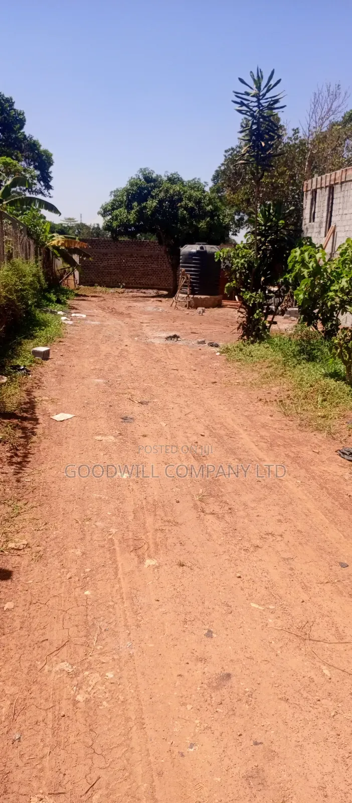 100*100 Plot of Land in Kikulu Town Namugongo on Nabusugwe Rd in Central Division