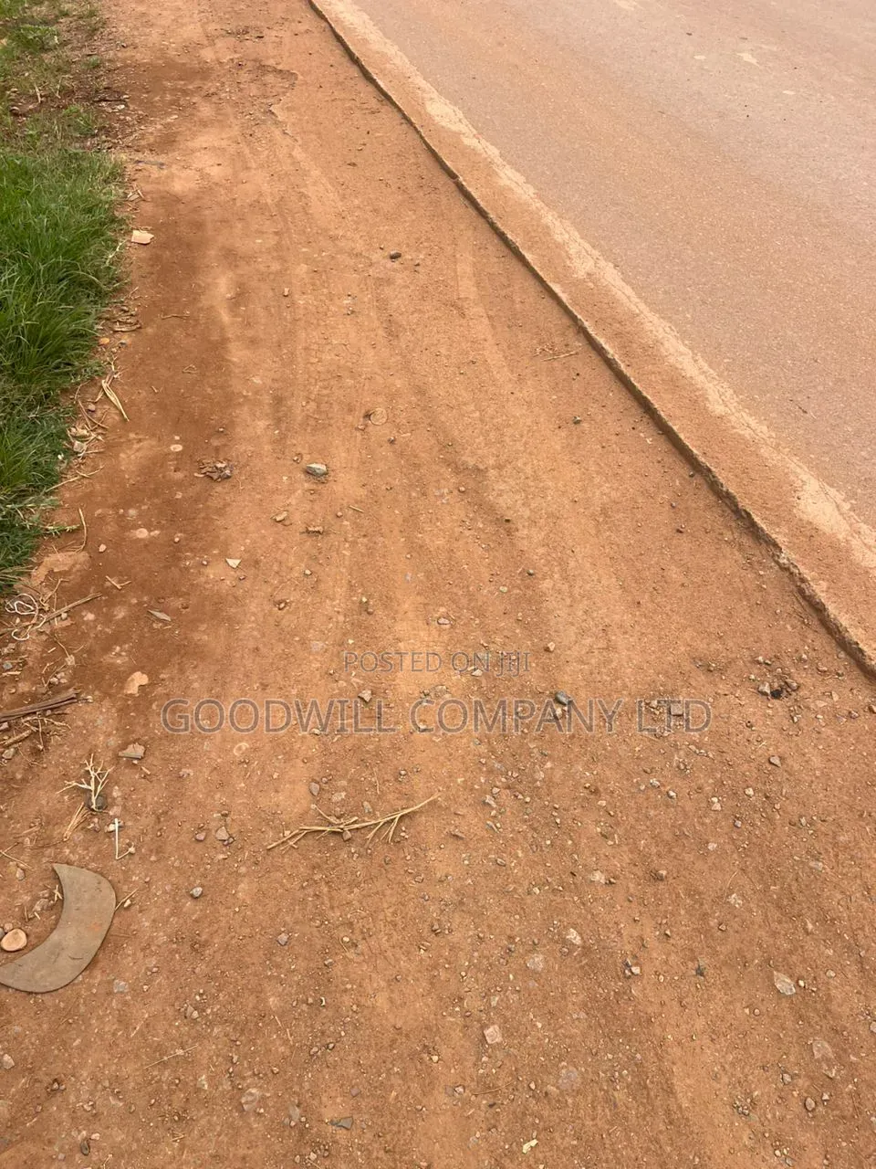 2 Acres of Commercial Land in Namugongo Touching on Main Tarmac Road in Central Division