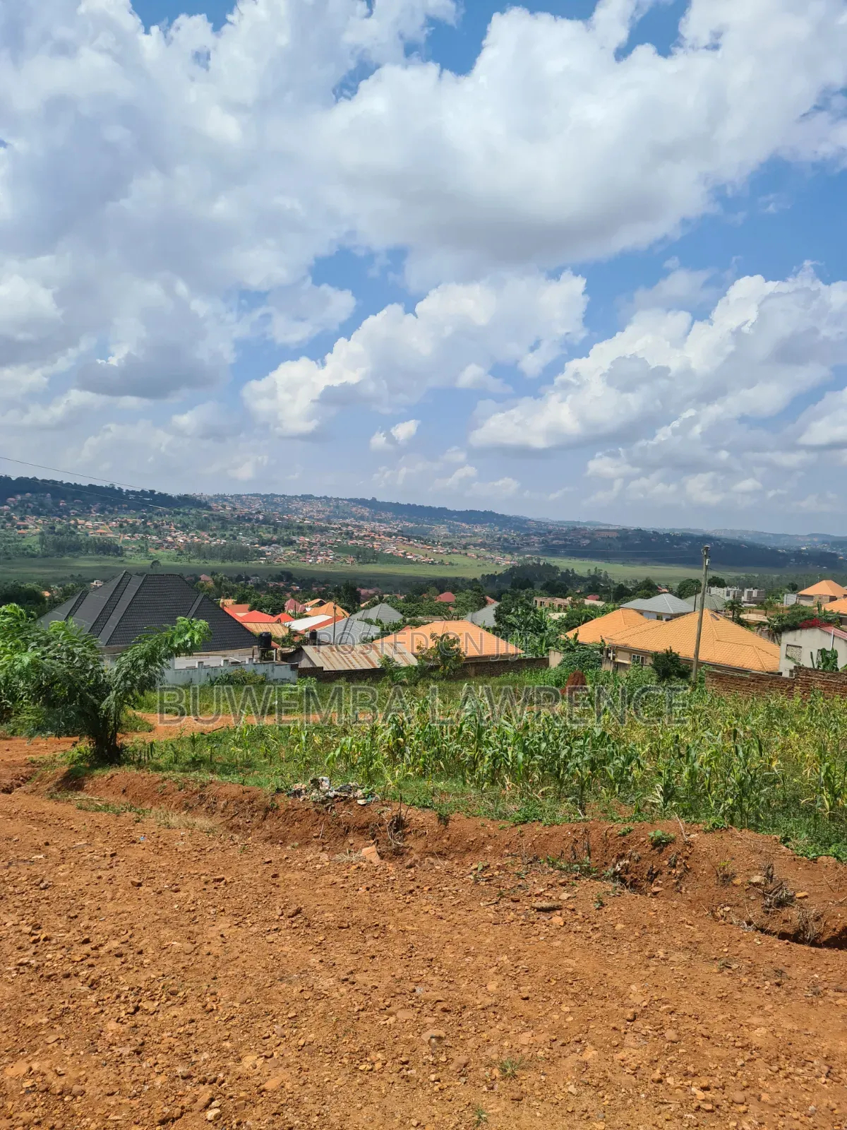 Land for Sale Title at Bwebajja Entebe Road 50x100 in Central Division