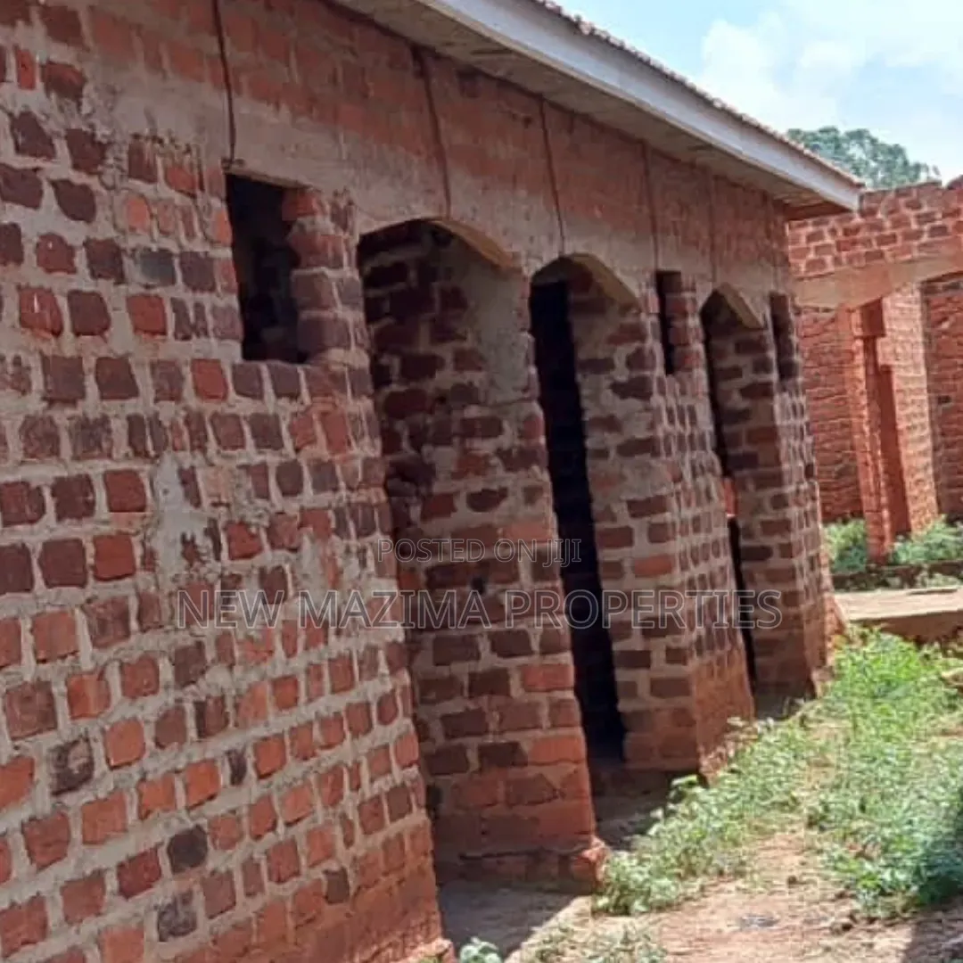 Three Semi Finished Rentals With Shop Forcedsale Heart of Nansana Town in Central Division
