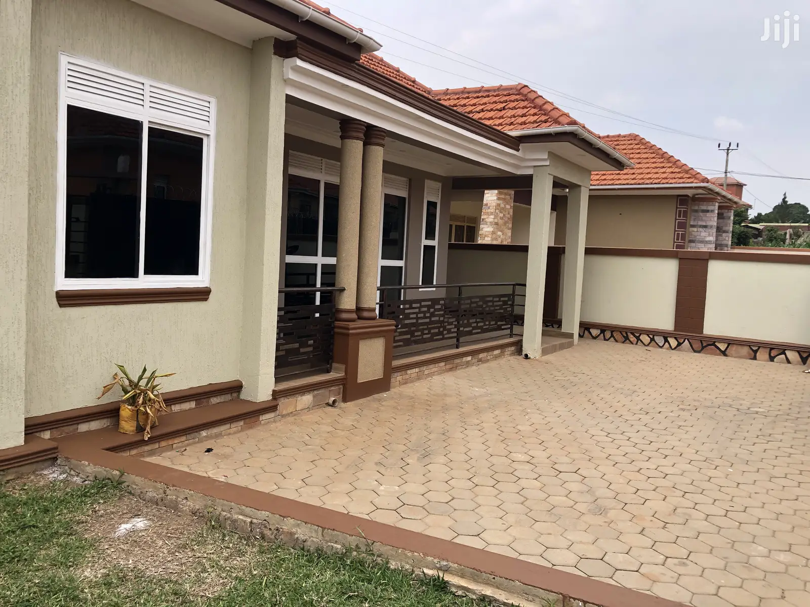Kira Mamerito Road House In Tarmacked Neighborhood in Kampala