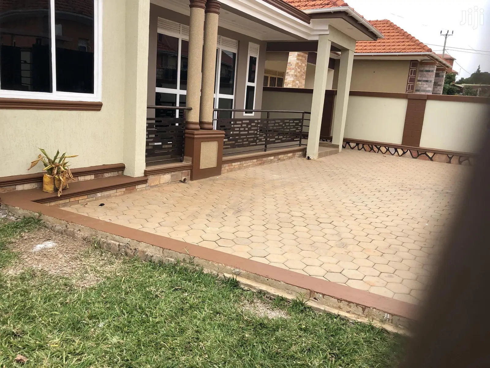 Kira Mamerito Road House In Tarmacked Neighborhood in Kampala