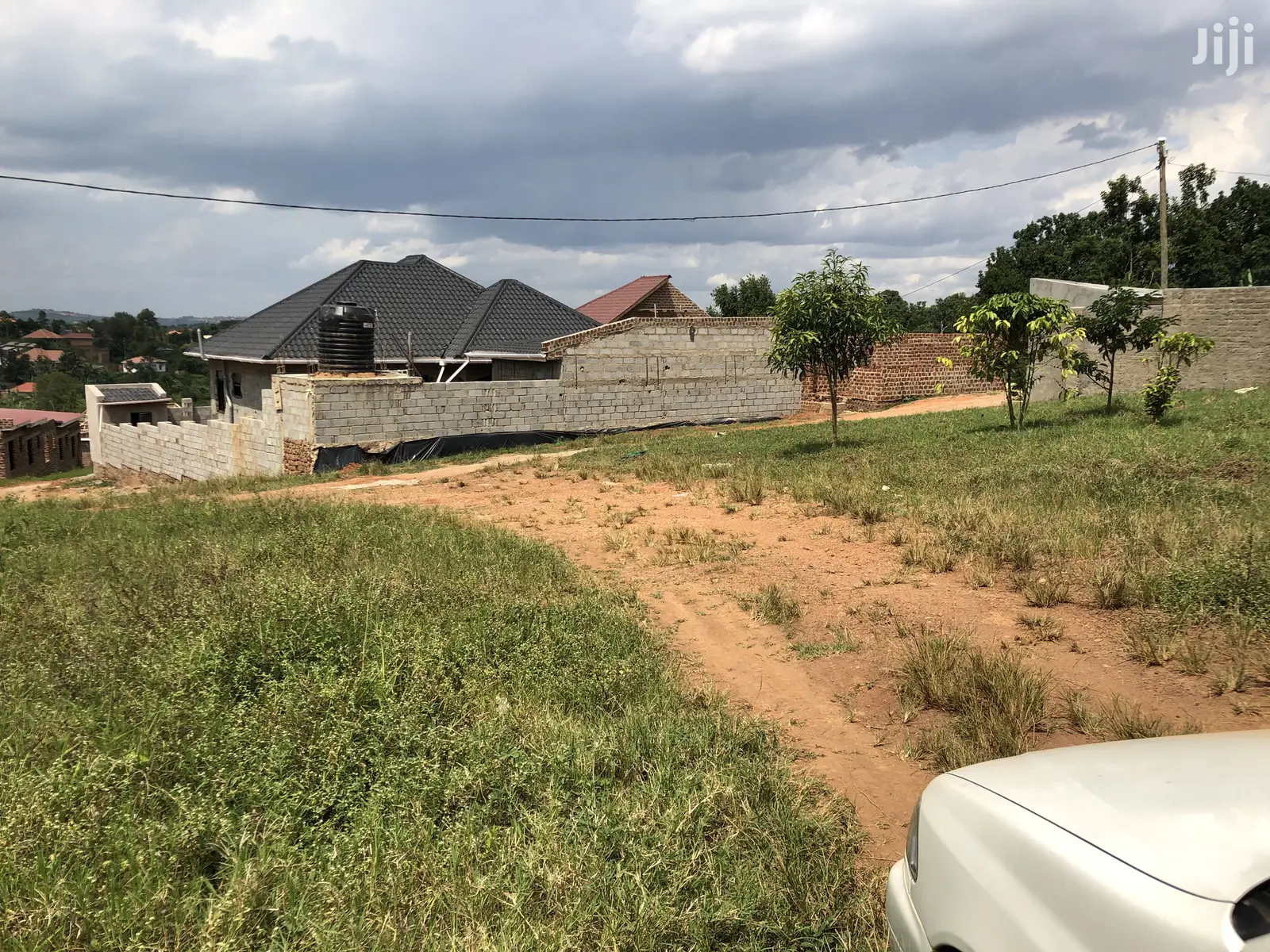 Kira Amazing Plot Near the Main Road on Sell in Kampala