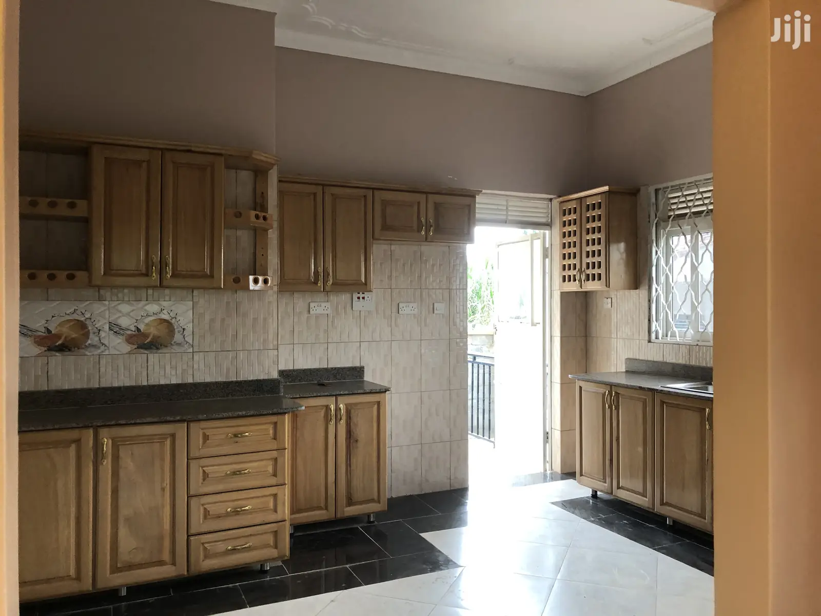 Kira Mansion in Tarmacked Neighborhood on Sell in Kampala