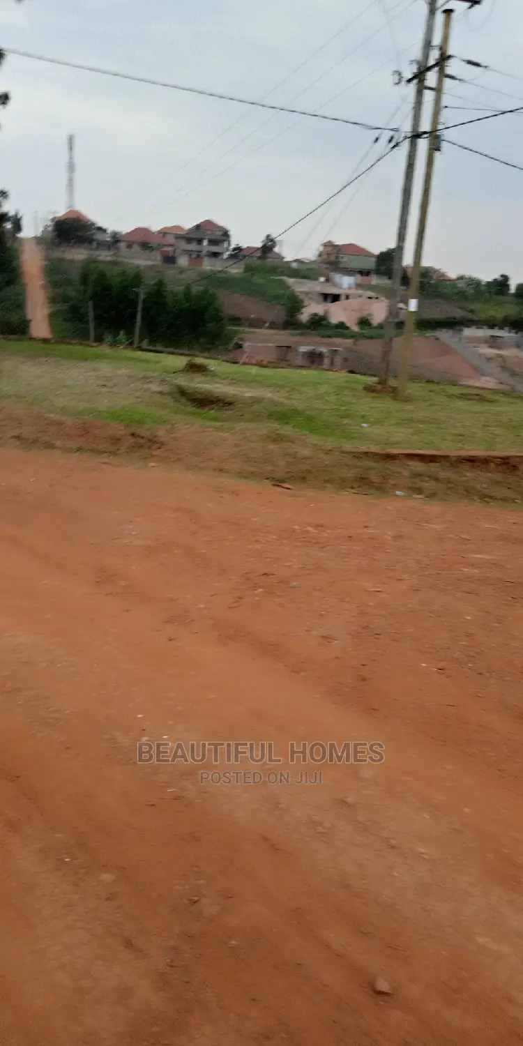 Kira Kimwani 2 Plots Near Tarmack in Kampala