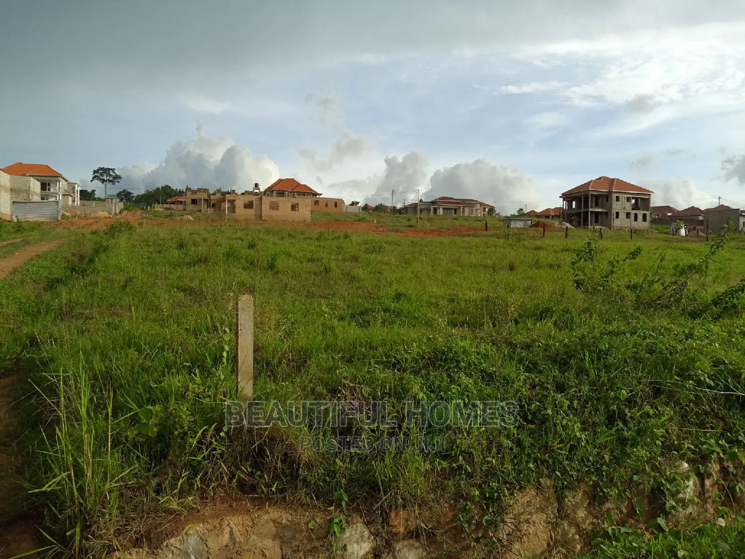 Kira Two Plots Close to the Main Road for Sale in Kampala
