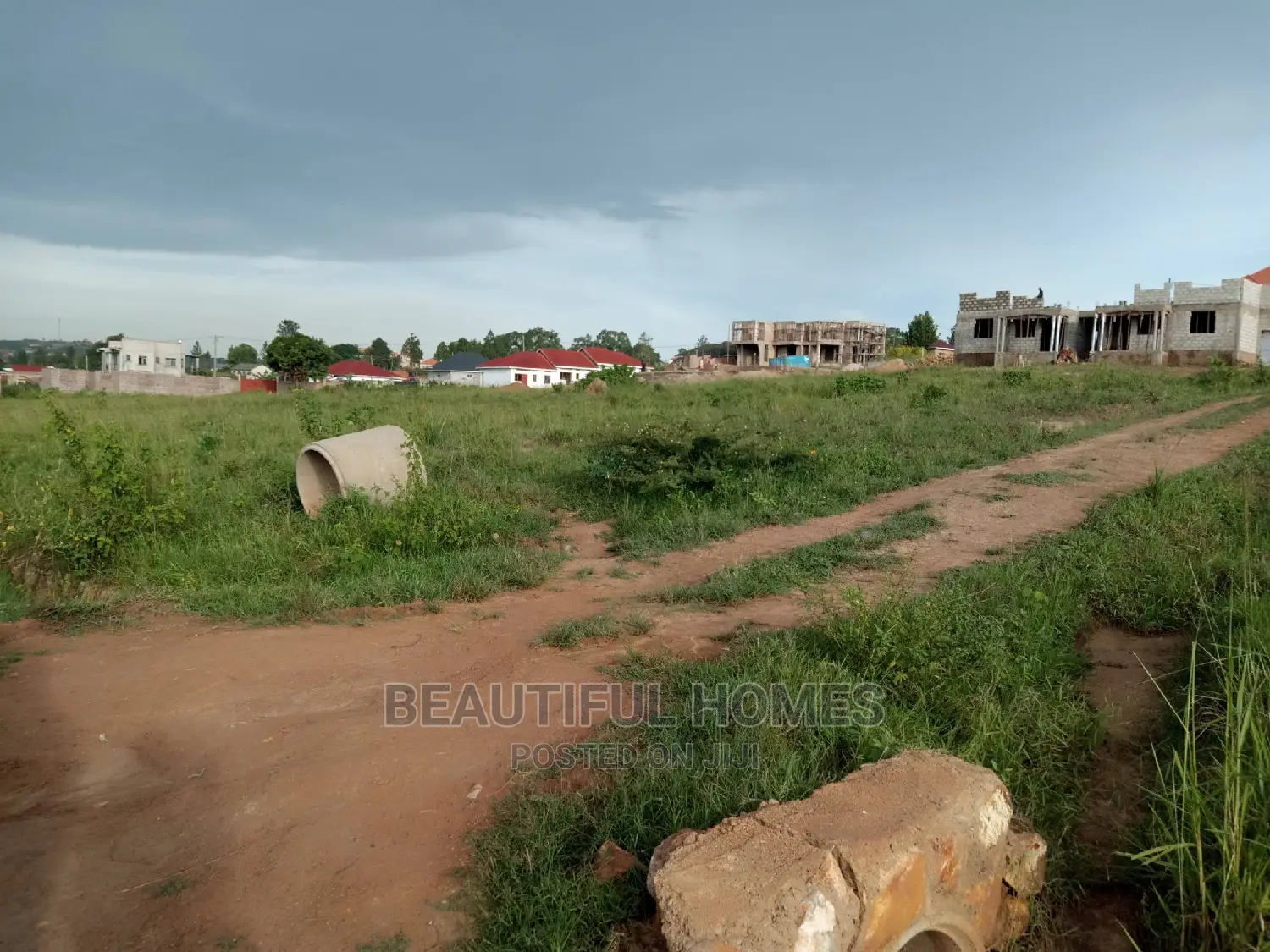 Kira Two Plots Close to the Main Road for Sale in Kampala