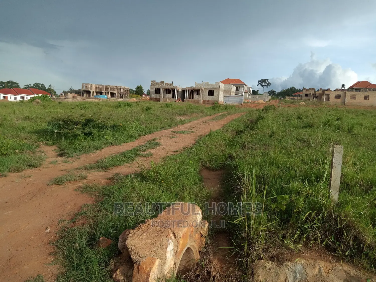 Kira Two Plots Close to the Main Road for Sale in Kampala