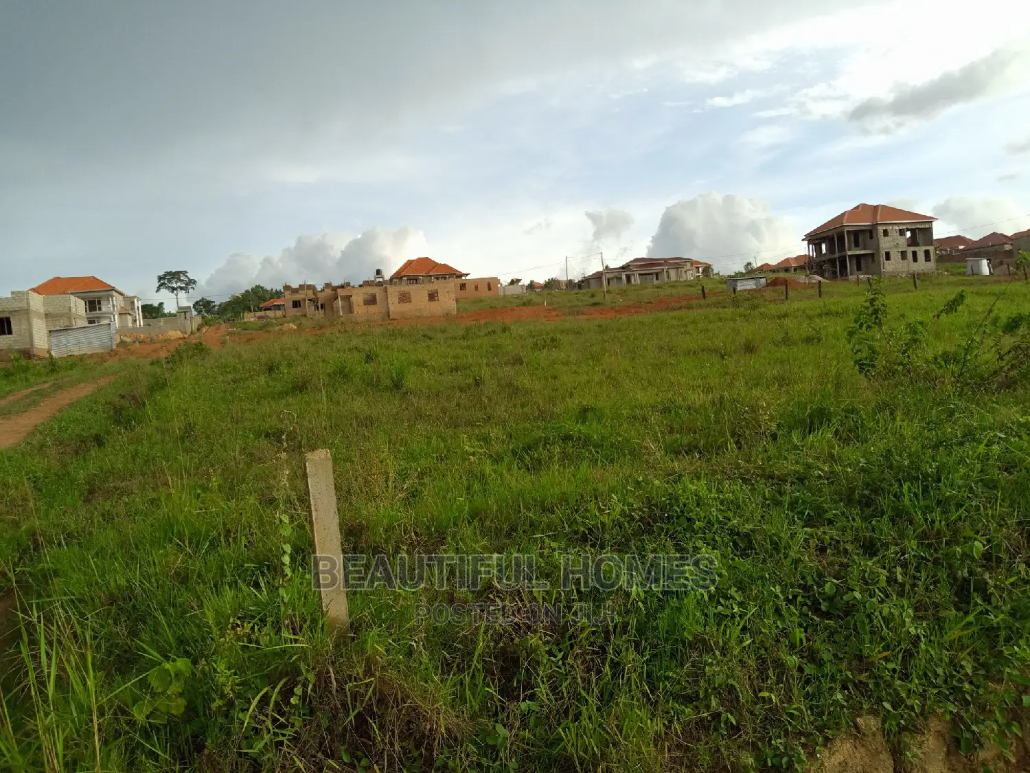 Kira Two Plots Close to the Main Road for Sale in Kampala