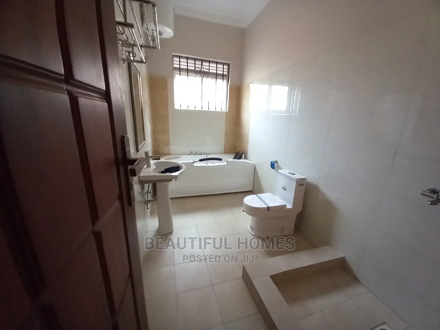 Furnished 4bdrm House in Tarmacked Estate, Kira for Sale in Kira