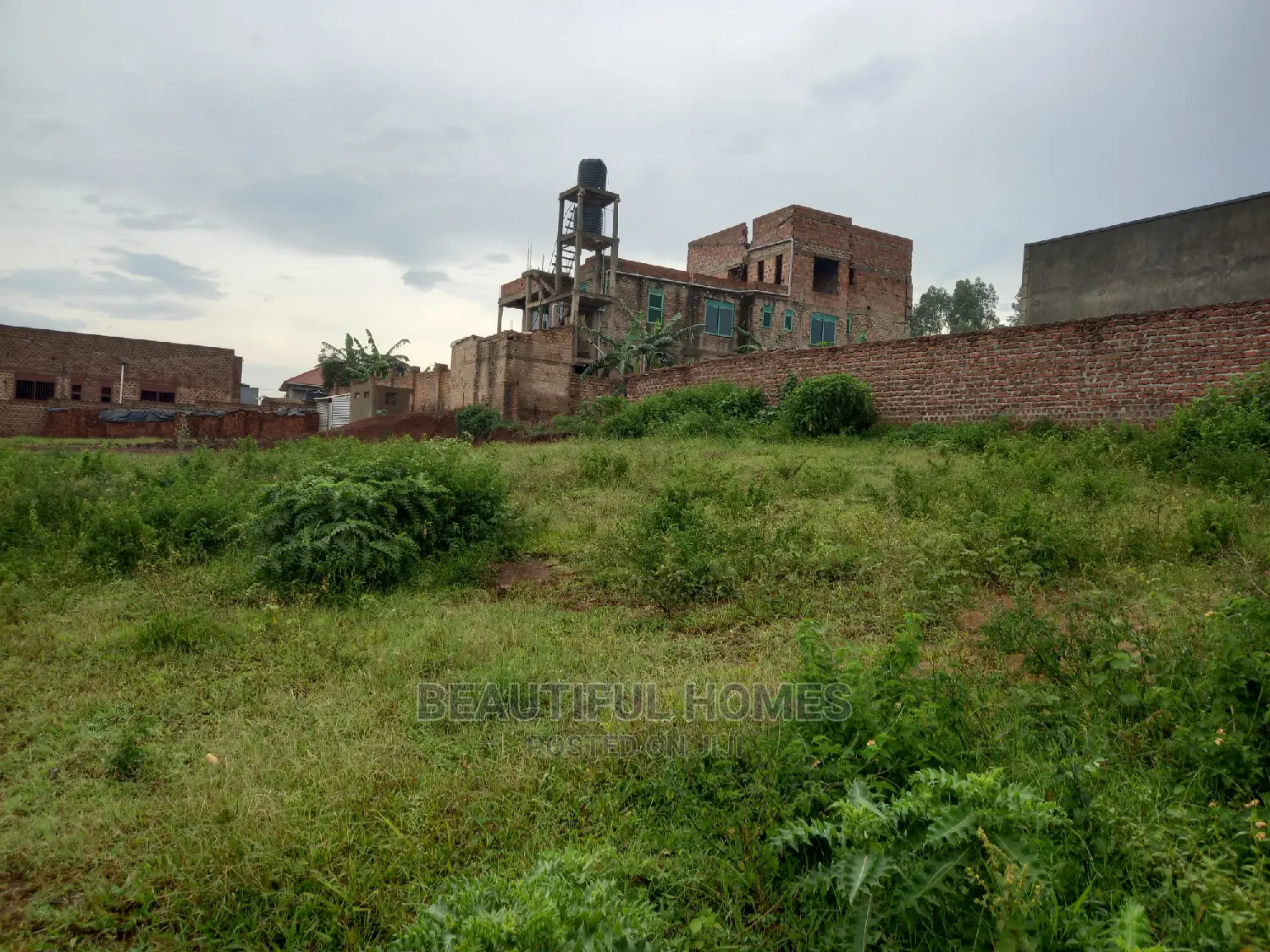 100*100 in Gated Estate of Kasangati,Quicksell in Kira